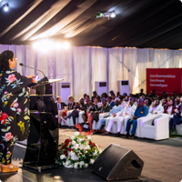 Conference speaker and audience